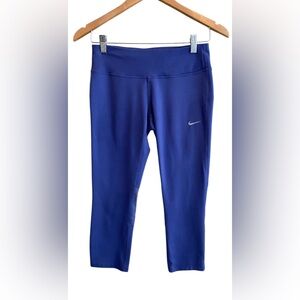 Nike: Blue Cropped Dri Fit Leggings with zipper pocket